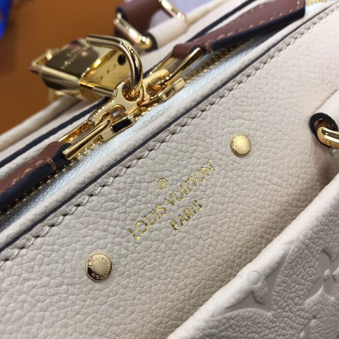 Louis Vuitton Monogram Empreinte Speedy Bandoulier Cream M42397