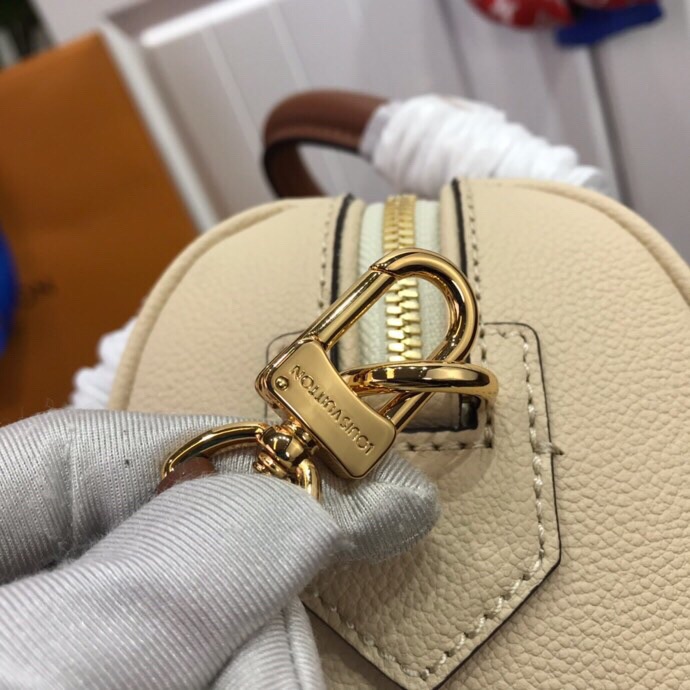 Louis Vuitton Monogram Empreinte Speedy Bandoulier Cream M42397