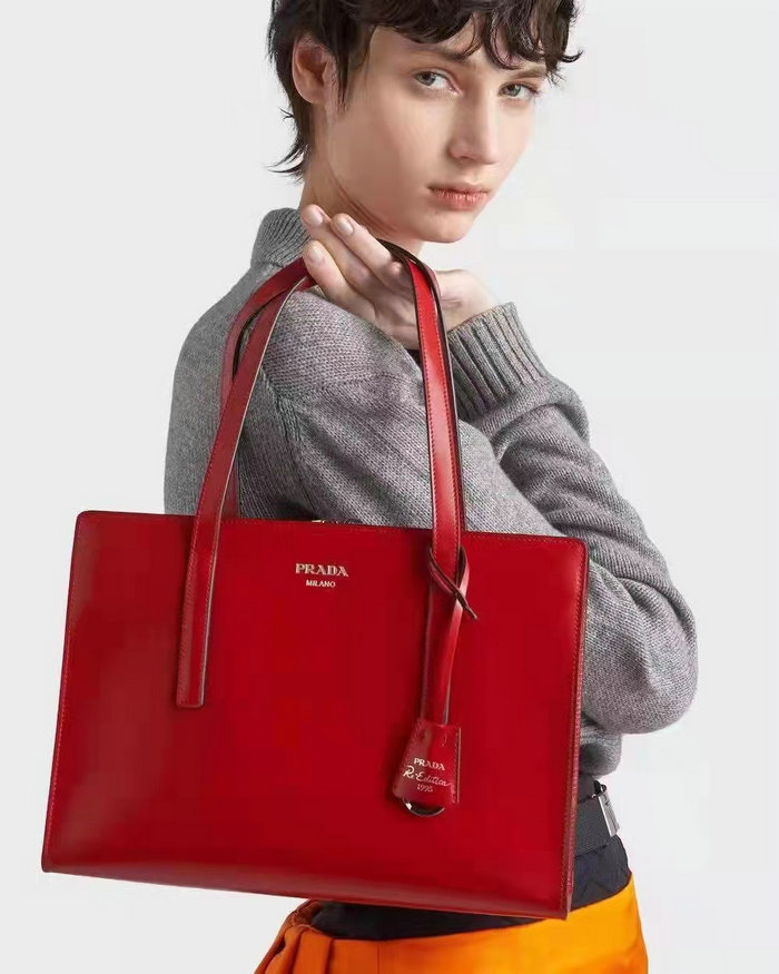 Prada Re-Edition 1995 brushed-leather medium handbag Red 1BA350