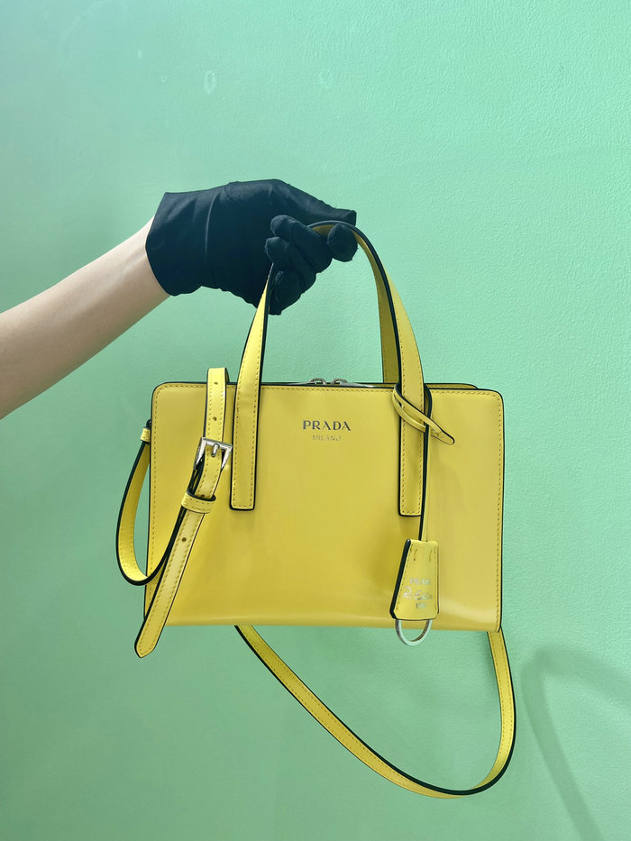 Prada Re-Edition 1995 brushed-leather mini handbag Yellow 1BA357