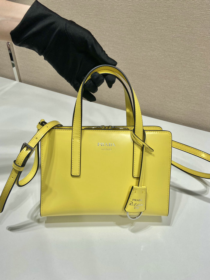 Prada Re-Edition 1995 brushed-leather mini handbag Yellow 1BA357