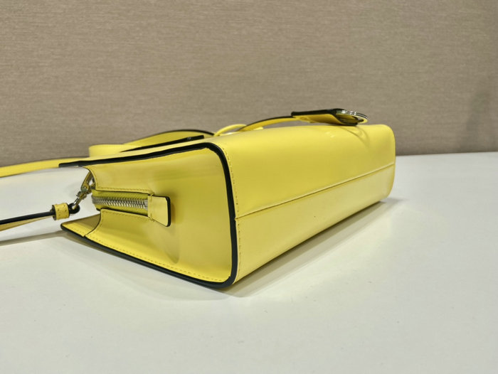 Prada Re-Edition 1995 brushed-leather mini handbag Yellow 1BA357