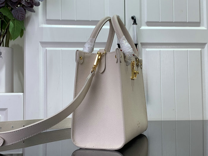 Louis Vuitton Lock & Go Cream M23637